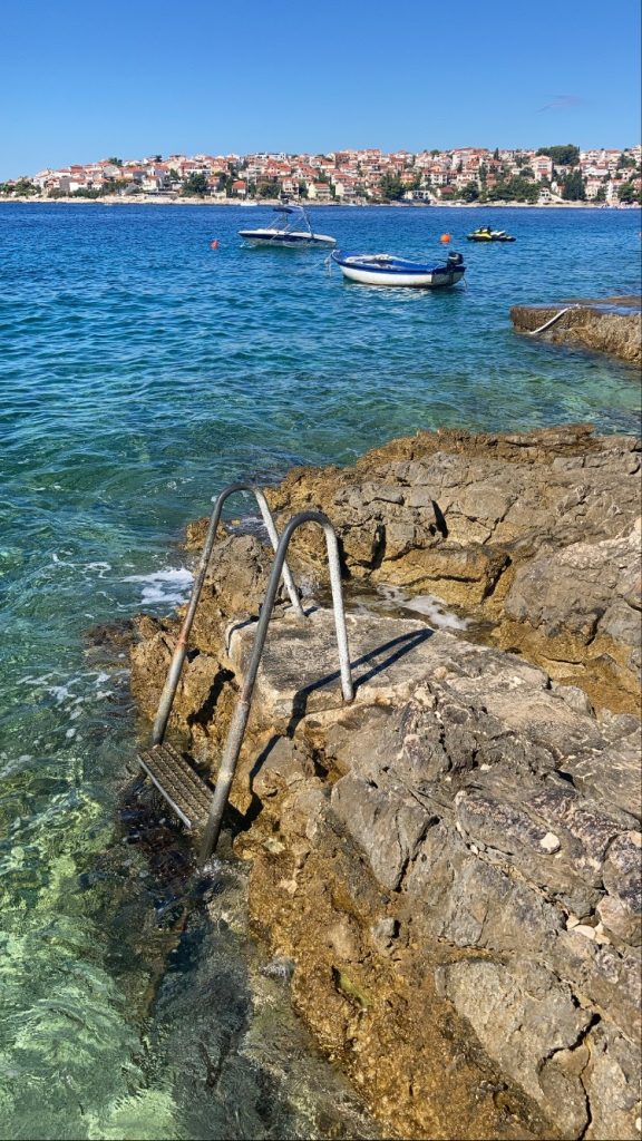 A ladder leading into the sea in Trogir, Croatia